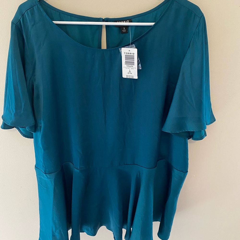 Torrid blue, satin, peplum top size 3x
